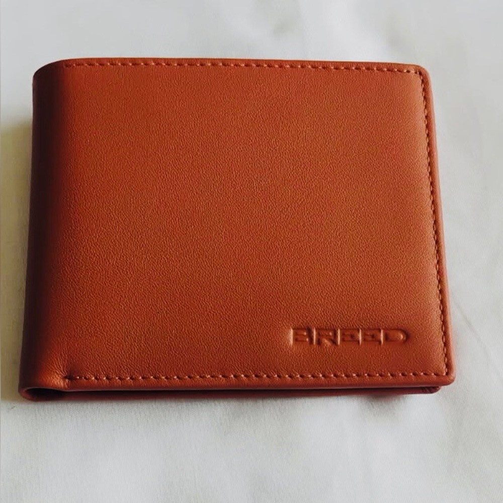 BREED embossed Bifold Wallet in cognac/ brandy